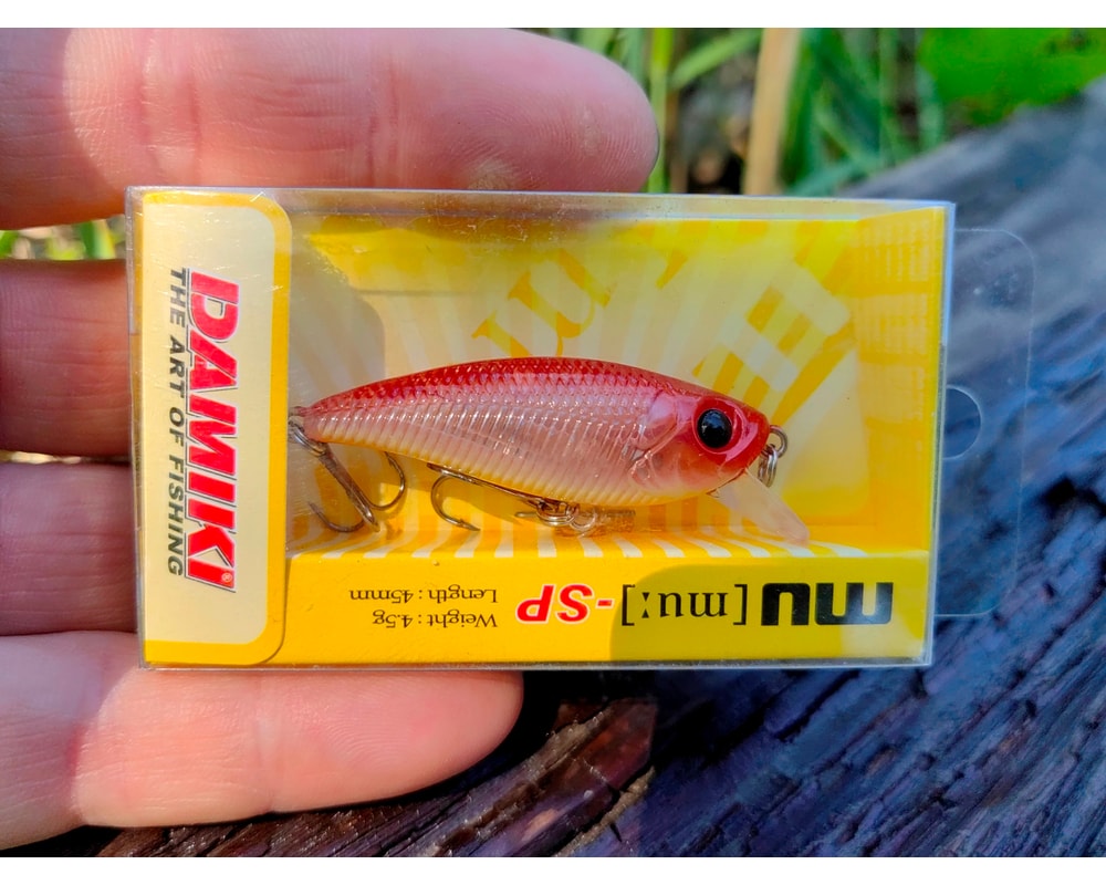 Damiki Mu 45 SP 224H Purplepiri — opakowanie, pełny kadr, Rybomania.pl