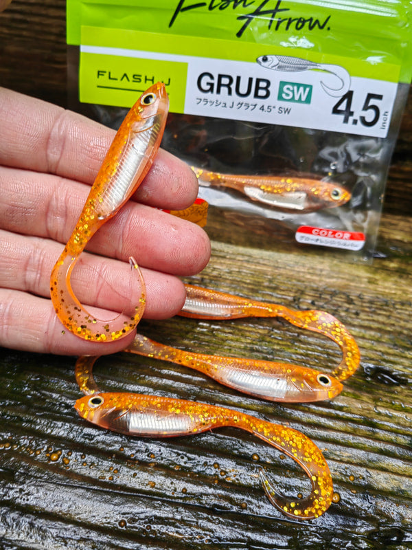Fish Arrow Flash-J Grub 4,5″ SW 121 Glow Orange/Silver — własne zdjęcie przynęty na dłoni