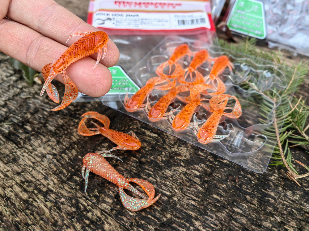 Megabass ROCK HOG 2″ 07 Clear Orange/Rainbow Flake — detale korpusu i ramion
