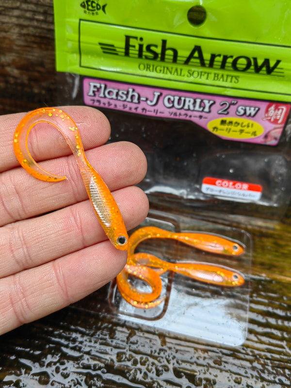Flash-J Curly 2" SW GLOW ORANGE/SILVER #121 — zdjęcie Rybomania